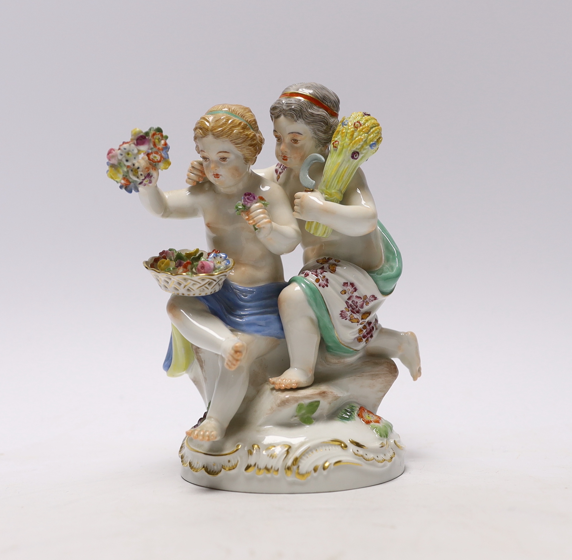 A Meissen flower group, emblematic of the seasons, 14.5cm high